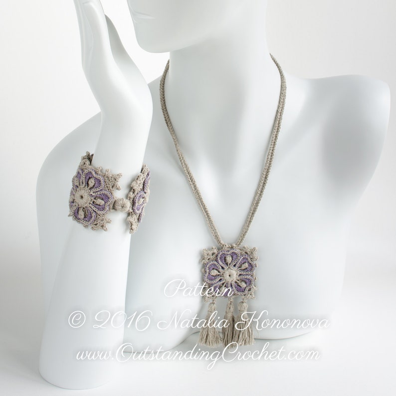 May include: A crocheted necklace and bracelet set with a purple flower design and tassels. The necklace and bracelet are made with a beige yarn. The text "Pattern &copy; 2016 Natalia Kononova www.OutstandingCrochet.com" is visible in the image.