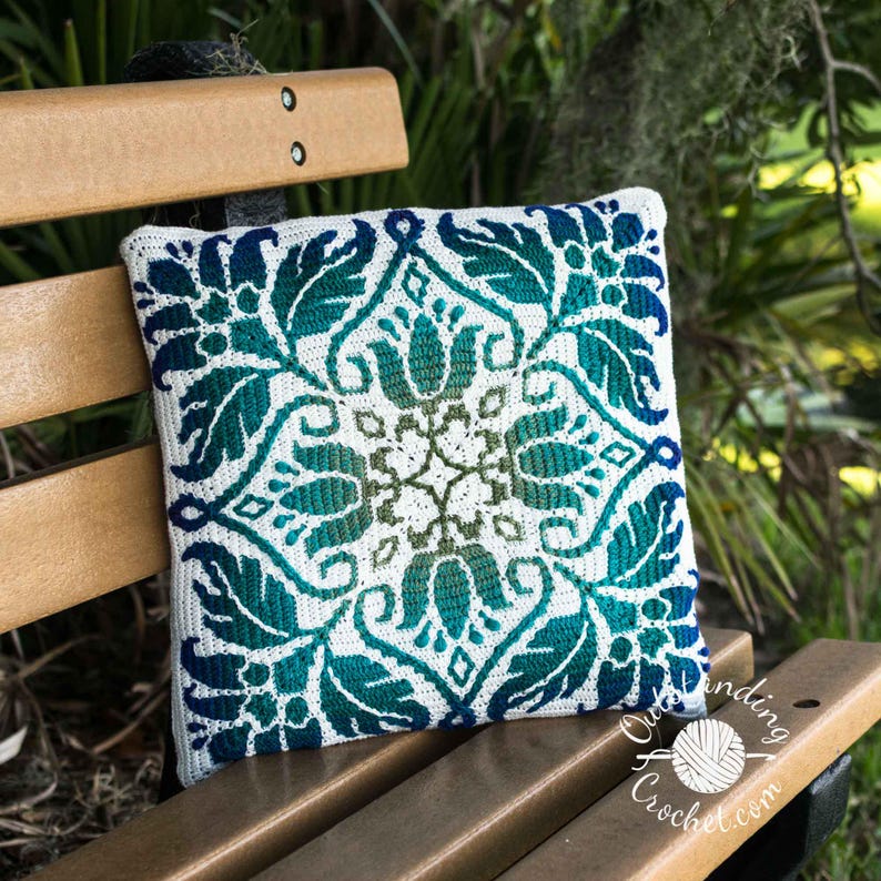 Petalique Pillows mosaic crochet pattern: smaller without a border and larger with a border. Made from the center without any tails to hide.  Features delicate flowers and leaves on the front with a plain back. Can be made as a wall hanging.