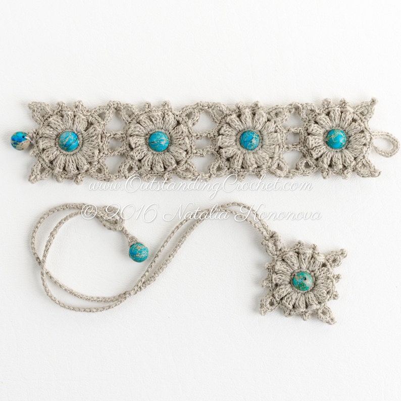 May include: A crocheted bracelet and necklace set with turquoise beads. The bracelet is made of beige yarn and features a repeating pattern of crocheted flowers. The necklace is a simple cord with a single crocheted flower pendant.