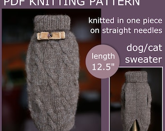 May include: A brown knitted dog or cat sweater with a cable knit pattern. The sweater is 12.5 inches long and is knitted in one piece on straight needles.
