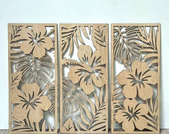 May include: Three wooden wall panels with laser-cut floral and leaf designs. The panels feature hibiscus flowers and tropical foliage in a natural wood tone. The panels are rectangular and arranged side by side.