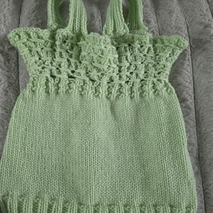 Handmade knitted mint baby dress