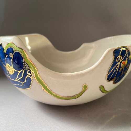 Blue shops poppy tabletop ceramic art. Surround yourself with pretty handmade decor.