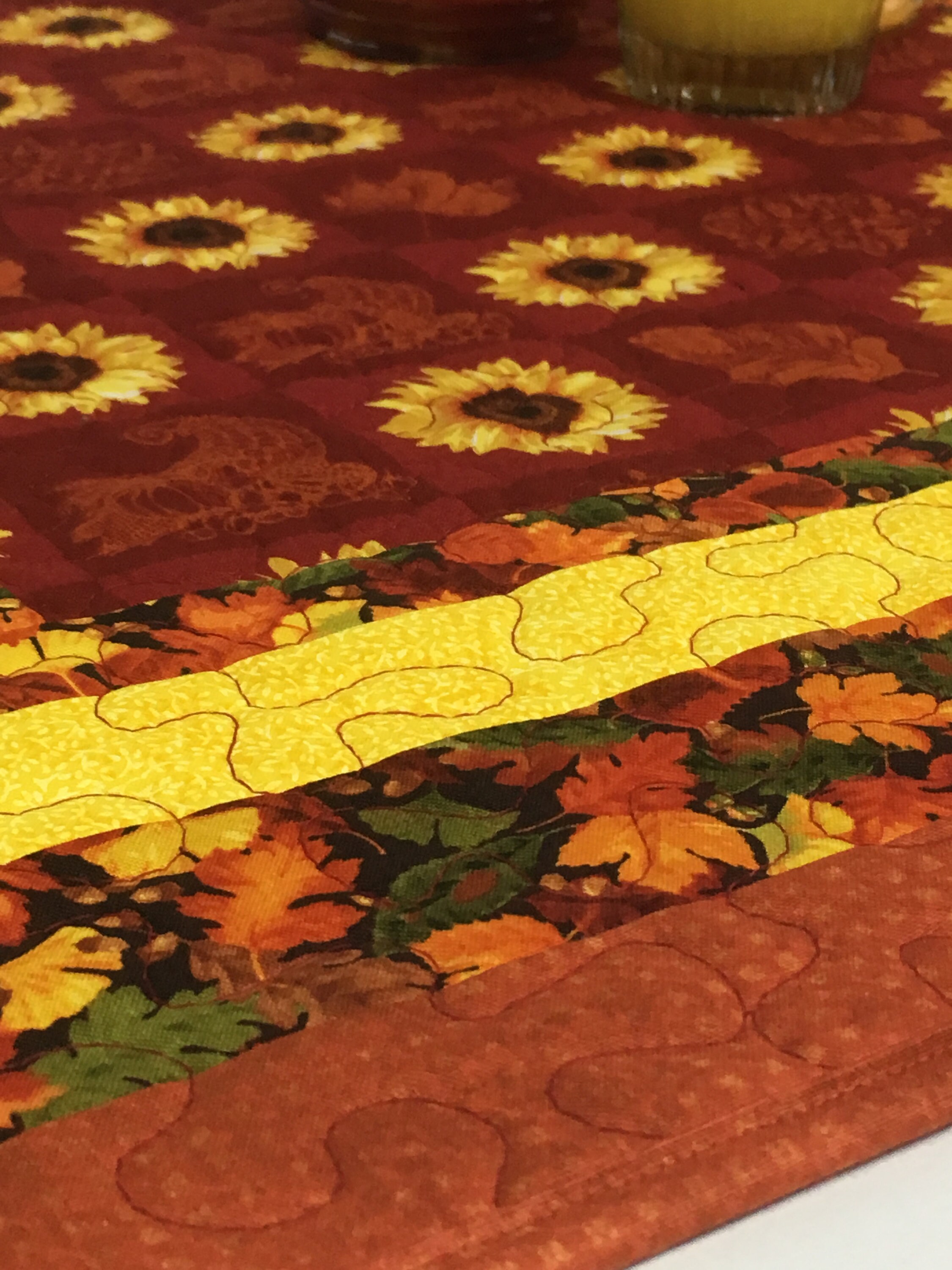 Autumn Sun Quilted Table Topper NCU0DV628