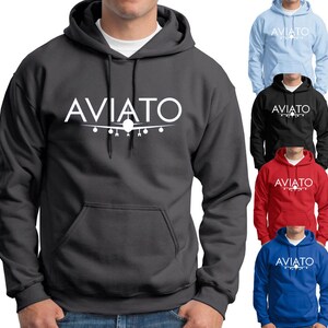May include: Five hooded sweatshirts in different colors, each with the word "AVIATO" printed in white on the front, and a stylized airplane graphic below the word. The sweatshirts are light blue, black, red, and blue.