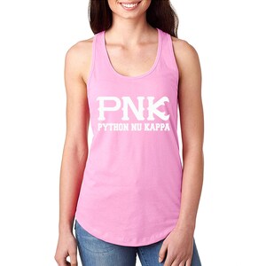 May include: A light pink racerback tank top with the white text "PNK PYTHON NU KAPPA" printed on the front. The tank top is made of a soft material and has a rounded hemline.