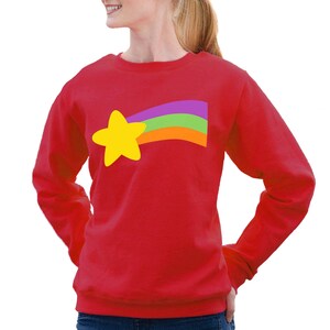 May include: Red long-sleeved sweatshirt with a yellow star and a rainbow design.