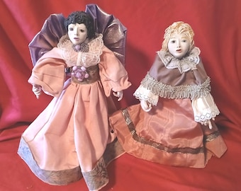 Weird handmade sister dolls