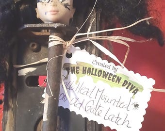 Doll head mounted on wood,  whimsical Barbie doll art