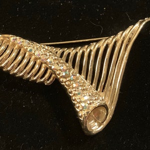 Gorgeous unusual scroll shape brooch with aurora borealis stones vintage