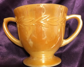 Fire King orange luster sugar bowl. Marked.