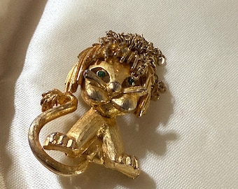 Mandle lion brooch with chain mane signed