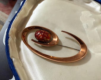 Matisse copper and red stone brooch spiral