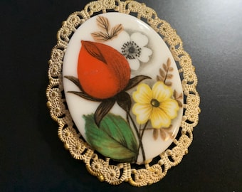 Porcelain Midcentury brooch with antiqued metal frame painted with roses