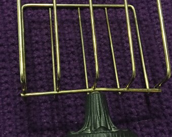 Grand vintage napkin or toast holder with cast iton base by desireable maker Emic