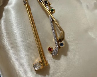 Pair of golf club rhinestone brooches