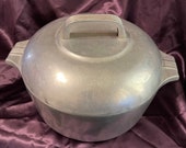 Wagner magnalight cast aluminum Dutch oven with metal handled lid