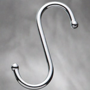 One chrome S-hook which serves as a useful hook for hanging various items.