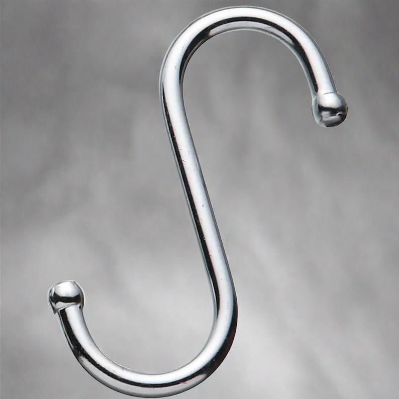 One chrome S-hook which serves as a useful hook for hanging various items.