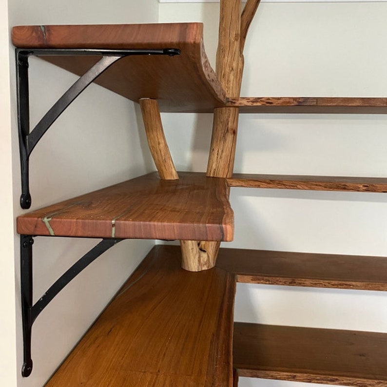 Industrial cast iron wall support installed in kitchen shelving