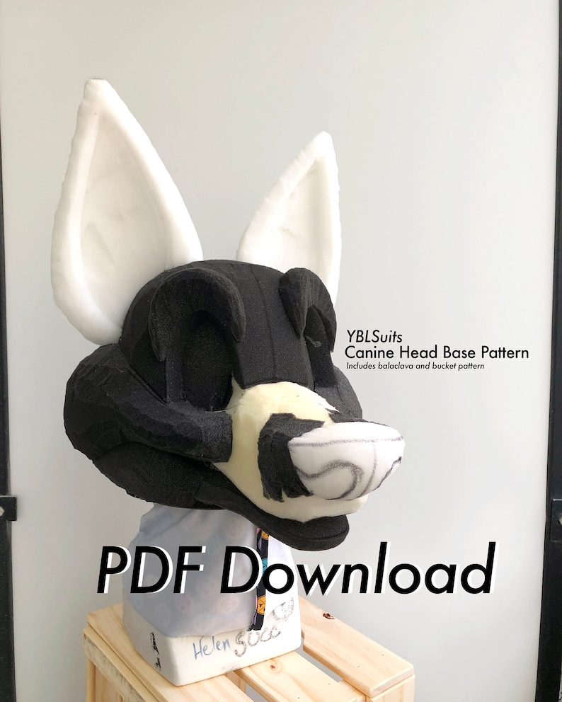 May include: A black and white foam canine head base pattern for creating a furry costume. The pattern includes a balaclava and bucket pattern. The text "YBLSuits Canine Head Base Pattern" and "Includes balaclava and bucket pattern" is visible on the image. The text "PDF Download" is also visible on the image.