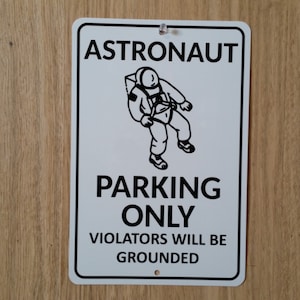 Astronaut Parking Metal Sign