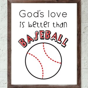 May include: A white framed print with the text "God's love is better than BASEBALL" in black with a red baseball graphic.