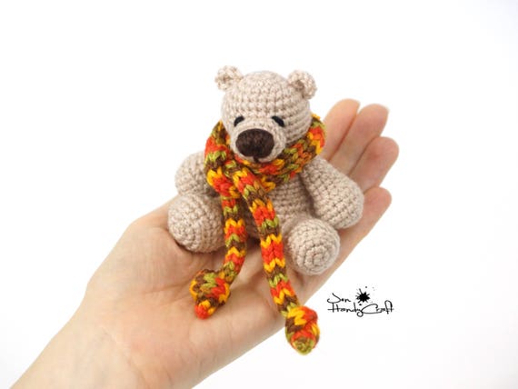 tiny stuffed bear