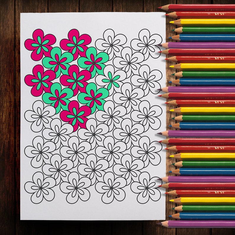 May include: A partially colored floral coloring page with pink and green flowers, next to a set of colored pencils. The pencils are arranged in a row, with a variety of colors including red, yellow, and purple.
