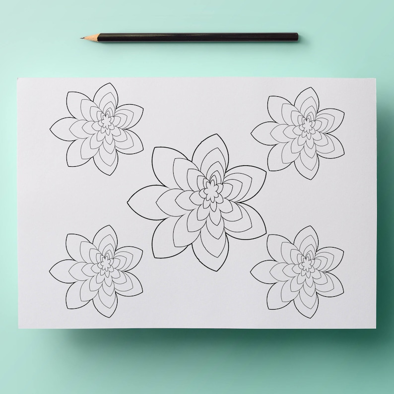 May include: A white sheet of paper with five black floral designs, each with multiple layers of petals. A black pencil rests at the top. The designs are for coloring or drawing.