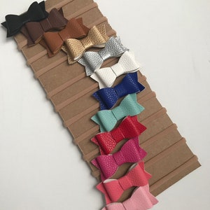 Set of 12 Faux leather bows, baby headbands, mini leather bows, leather bow baby headband set. Nylon headbands Christmas bows
