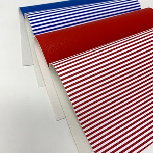 May include: Four different fabric samples, including a red solid, a red and white striped fabric, a blue solid, and a blue and white striped fabric.