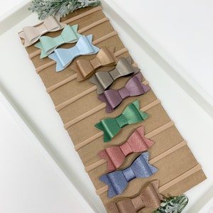 Set of 10 Faux leather bows, baby headbands, mini leather bows, leather bow baby headband set. Nylon headbands Christmas bows K208