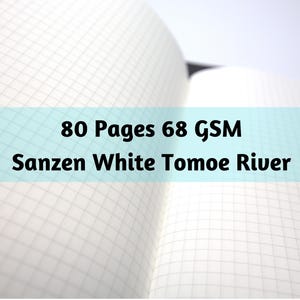 May include: Open notebook with white grid paper. The text on the image reads: "80 Pages 68 GSM Sanzen White Tomoe River". The pages are open, showing the grid pattern. The paper appears to be high quality.