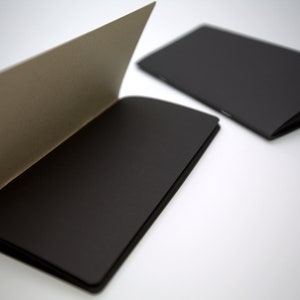 N017: Black Paper 89 GSM 40 Pages Notebook