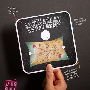 May include: A humorous greeting card with a cartoon illustration of a person holding a map with a red line drawn across it. The card reads "If he doesn't suggest three different routes for your journey, is he really your dad?" The card is made from responsibly sourced materials and is 350 gsm heavyweight.