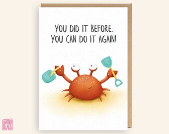 May include: A greeting card with a cartoon crab holding a bucket and shovel. The card reads "You did it before. You can do it again!"