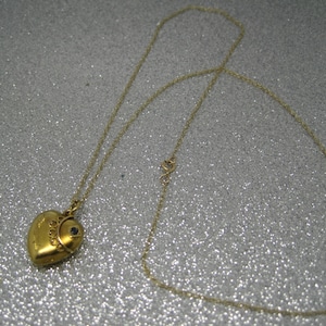 Antique gold and sapphire heart pendant and chain