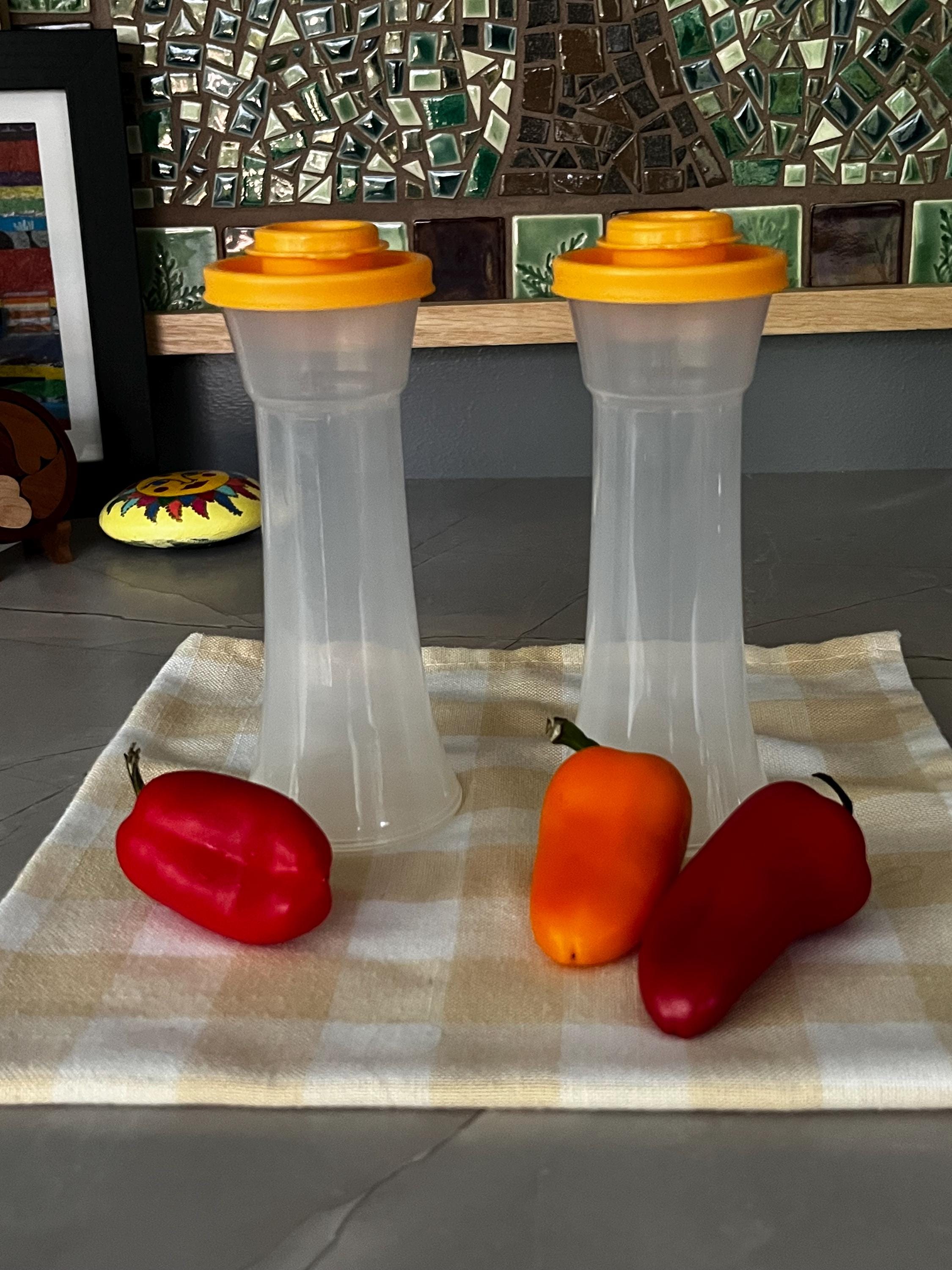 thumbnail interactive-video image 1 of Tupperware Mini Hourglass Salt & Pepper Shakers - 4 Inch Red Seal Containers 1 of 6