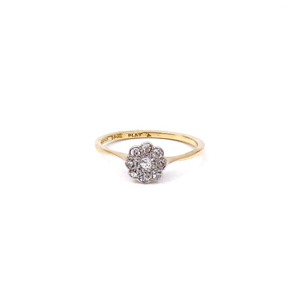 Vintage diamond daisy ring, beatiful delicate diamond flower ring in 18kt gold and platinum.