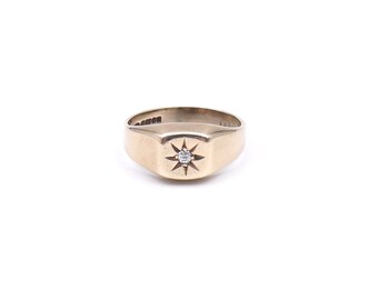 A lovely vintage signet ring, diamond set star signet ring in 9kt gold, a small signet ring with a rounded appearance.
