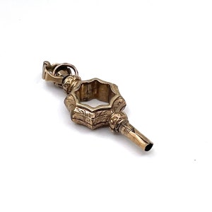 Antique watch key, a perfect antique pendant to hang on a chain, an old watch key.