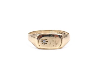 Vintage 9kt gold signet ring, with a diamond set star and a faded engraved M, horizontal signet ring.