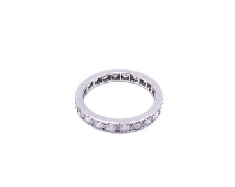 Diamond platinum eternity ring, a full eternity diamond band, ideal anniversary gift.