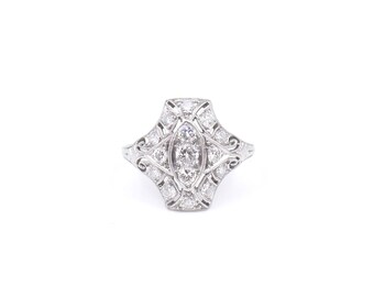 Art Deco diamond ring, set in platinum, diamond platinum ring with a geometric design.