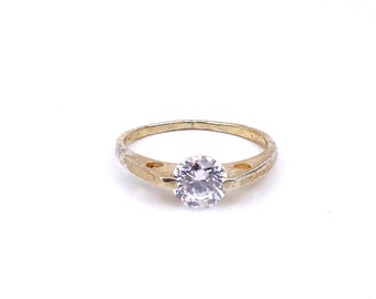 A crystal and silver plated gold ring, a contemporary preowned ring with a solitaire crystal.