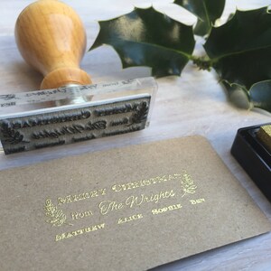 May include: A gold foil stamp with the text "Merry Christmas from The Wrights" and a sprig of holly. Below the text are the names Matthew, Alice, Sophie, and Ben.