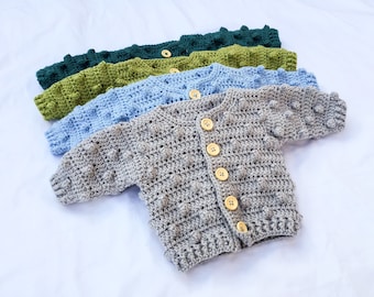 Crochet baby cardigan with bobble design