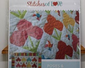 Quilt pattern. Stitches of Love, Posies Pinwheels. Size 42.5 quot square made with fat quarters. Crib, baby or table size quilt.