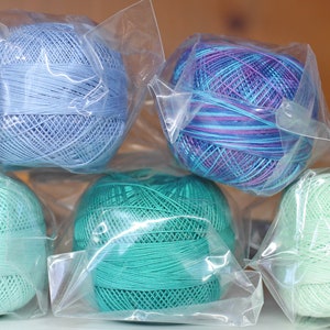 Lizabeth crochet or tatting thread.  Size 40 cotton crochet thread.  I have 2 size 20 threads left, Country Grape.
